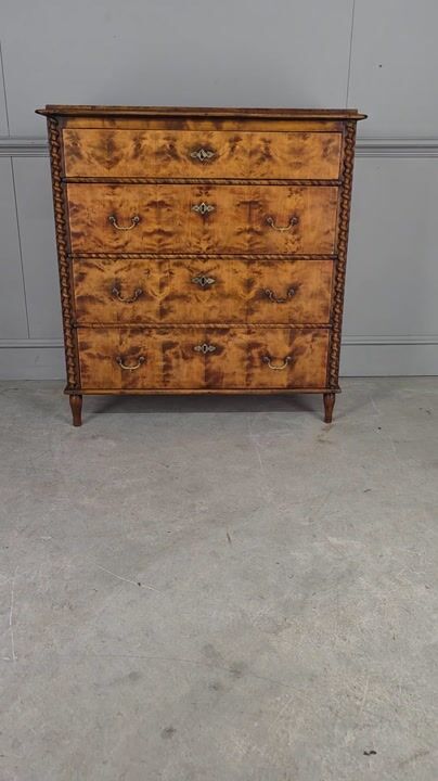 Film of Swedish Flame Birch Chest of Drawers.