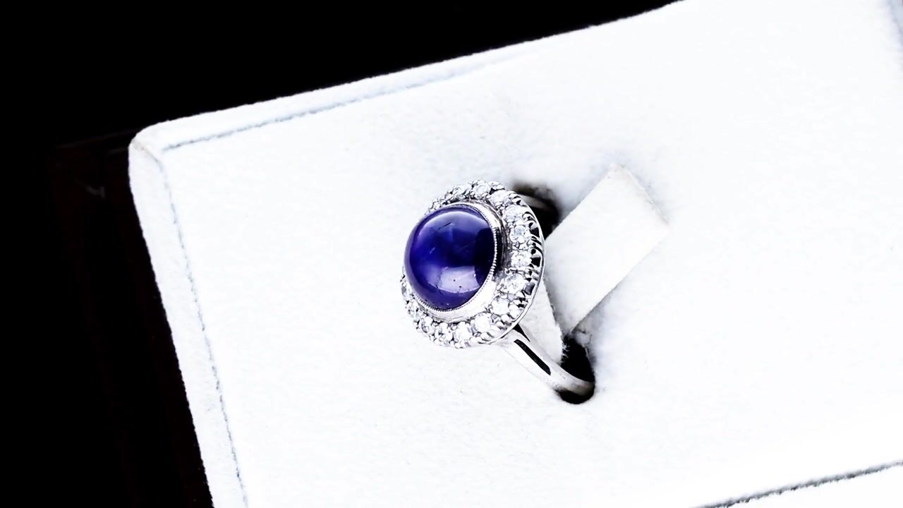 Film of Antique 5.40ct Star Sapphire and 0.40ct Diamond Platinum Cluster Ring Circa 1920