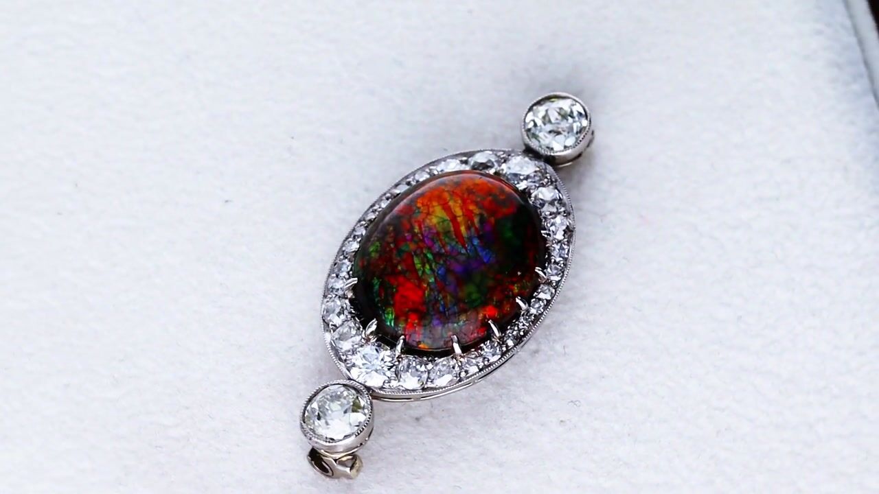 Film of Antique 8.64ct Boulder Opal and 3.00ct Diamond Platinum Brooch Circa 1900