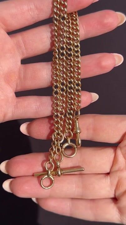Film of Antique 17.5" 15ct Gold Bolt Ring and Dog Clip Albert Chain Necklace