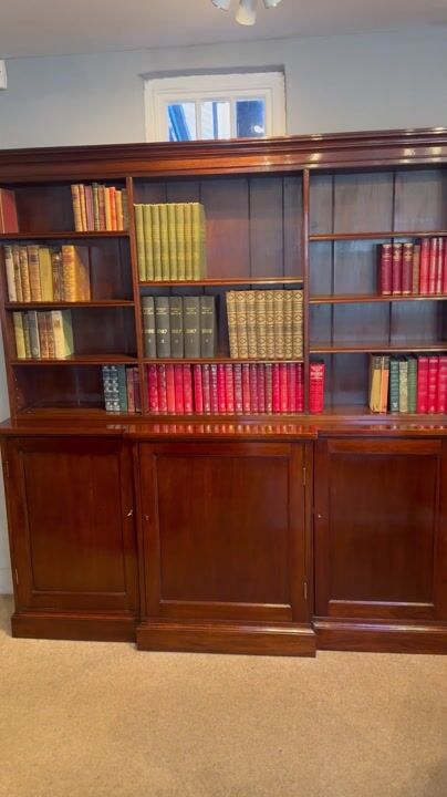 Film of Edwardian Mahogany Breakfront Bookcase with Open Shelving & Cupboard Storage C.1900