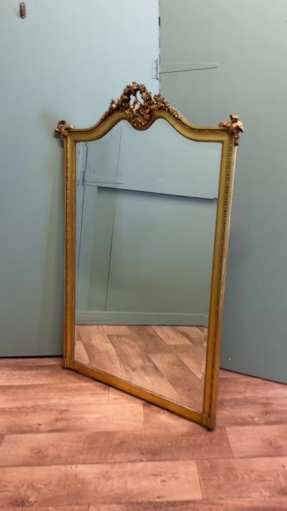 Film of A Large French Rococo Gilt Console Mirror Decorated with Flowers and Ribbons