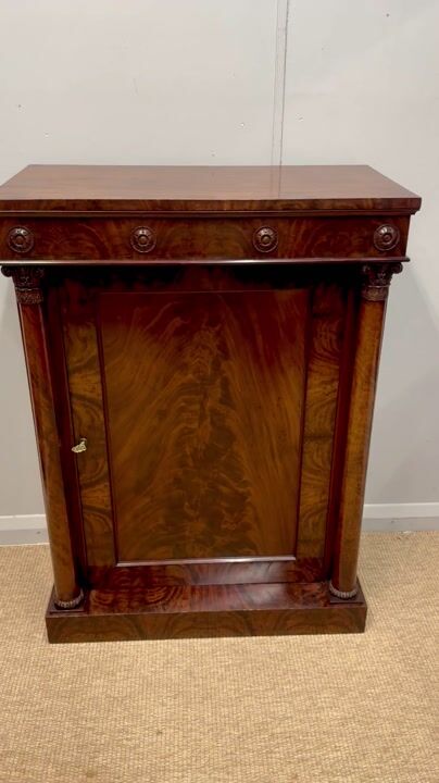 Film of Late Regency Mahogany Pier Cabinet with Adjustable Shelves
