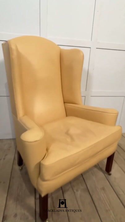 Film of Leather Upholstered Wingback Armchair