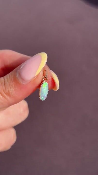Film of Antique 15ct Gold Natural Solid Opal Oval Charm Pendant