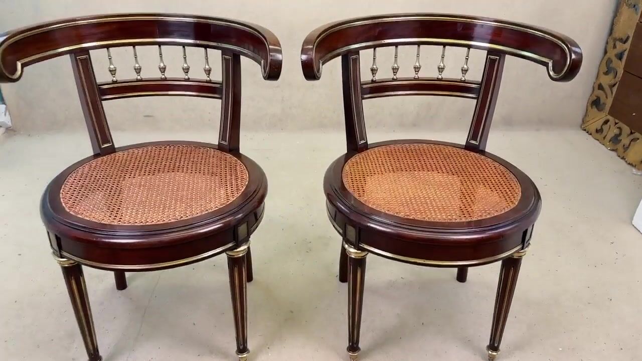 Film of Pair of 19th Century French Mahogany Salon Chairs