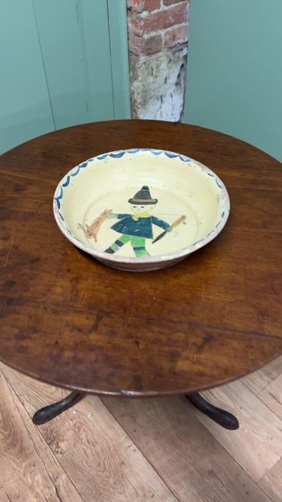 Film of Large Early French Terracotta Slip-ware Bowl, the Hunter