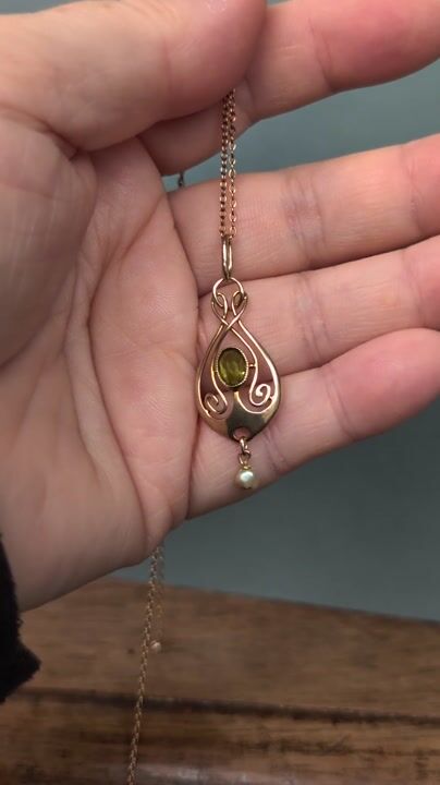 Film of Edwardian 9ct Gold Peridot Murrle Bennett Pendant