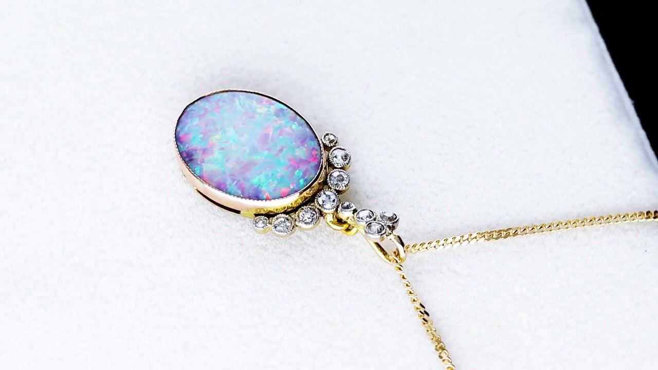 Film of Antique 3.05ct Opal and 0.32ct Diamond 9ct Yellow Gold Pendant Circa 1910
