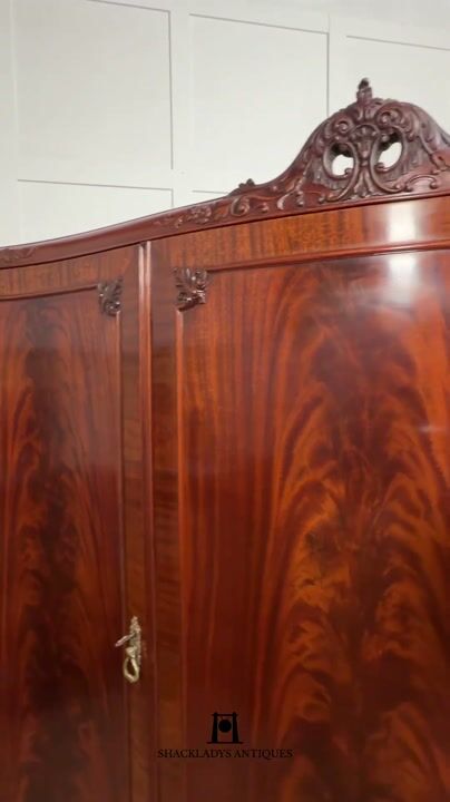 Film of Mahogany Three Door Compactum Wardrobe