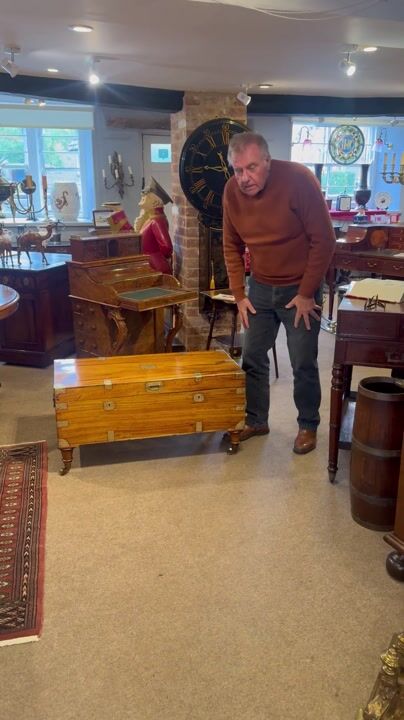 Film of Antique Brass Bound Camphor Wood Military Chest Coffee Table on Castors