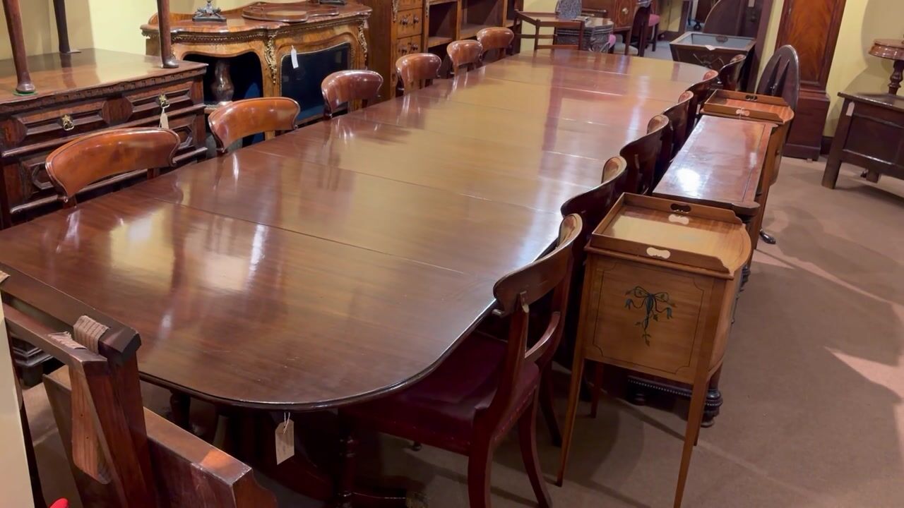 Film of A Large Early 20th Century Mahogany Four Pedestal Dining Table