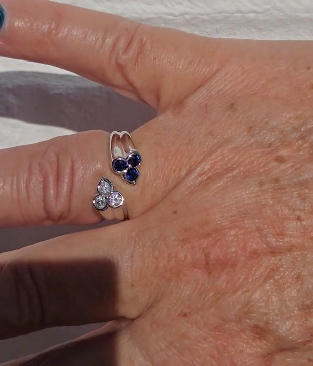 Film of A Fine Mid-century 18ct White Gold, Sapphire, and Diamond Crossover Ring, Signed Kutchinsky, Complete with Original Fitted Presentation Case