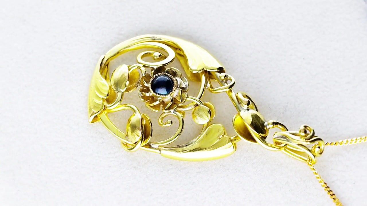 Film of Antique Art Nouveau 0.36ct Sapphire and 14ct Yellow Gold Pendant Circa 1900