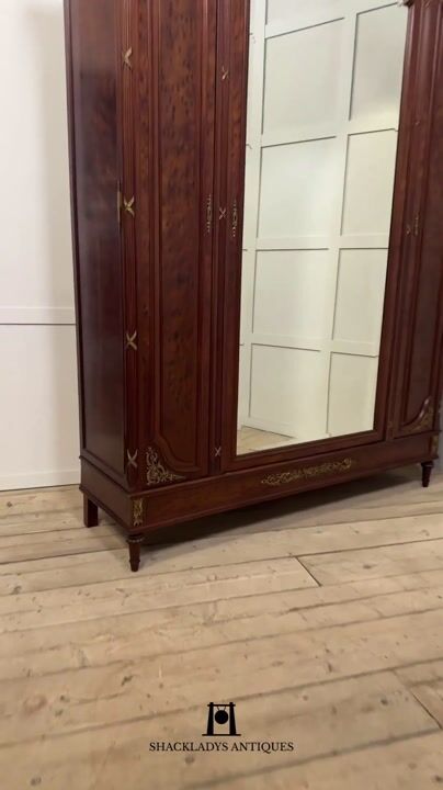 Film of 19th Century French Louis XVI Mahogany and Gilt Bronze Wardrobe