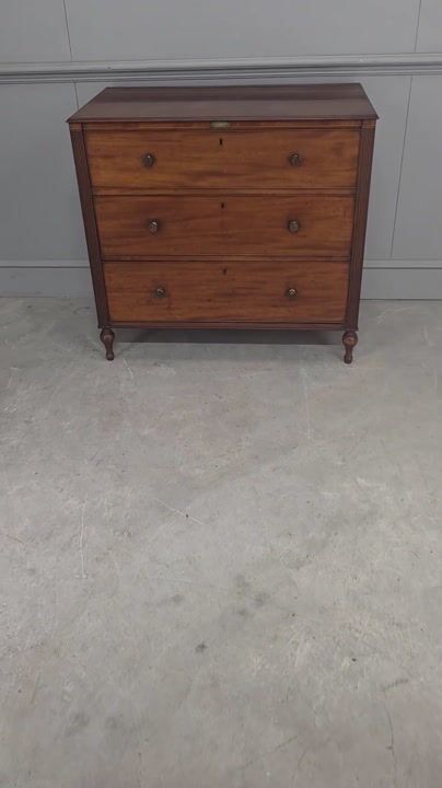 Film of A Fine Regency Mahogany Chest of Drawers