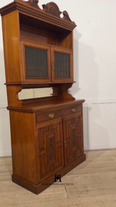 Film of Oak Cabinet with Leaded Glass Doors
