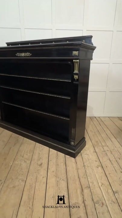 Film of Large Ebonised Brass Mounted Open Bookcase